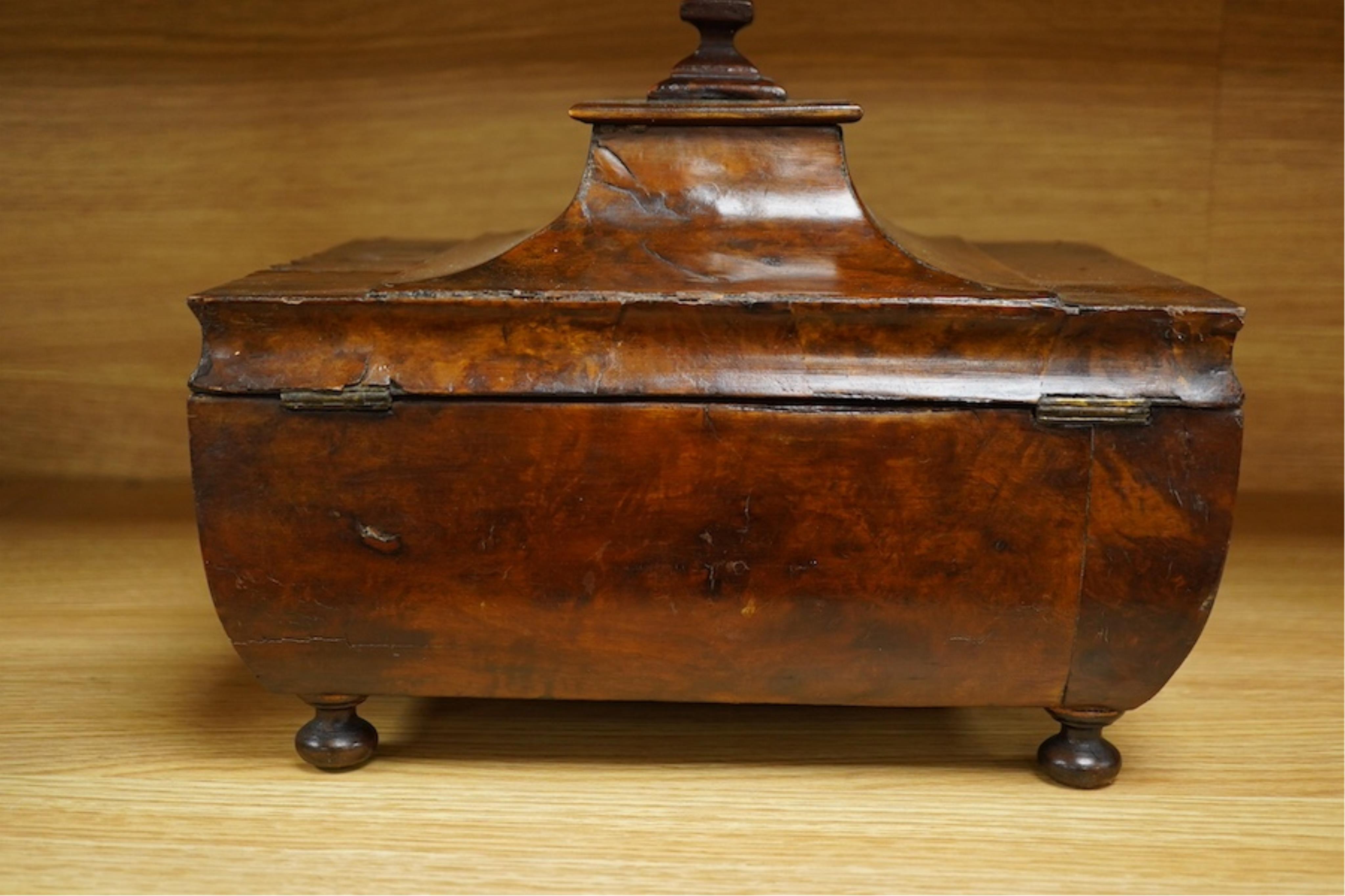 A Victorian burr walnut pagoda’ shaped sewing box incorporating a folding writing slope, 28cm wide. Condition - poor to fair